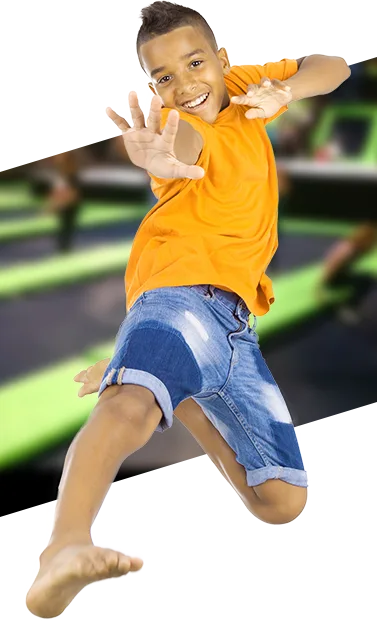 Kid jumping on a trampoline at a Fly High park